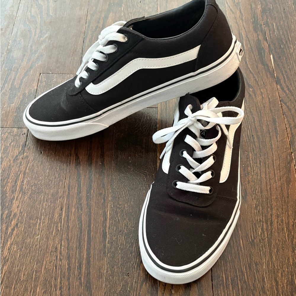 Vans women’s Classic Black and White Sneakers